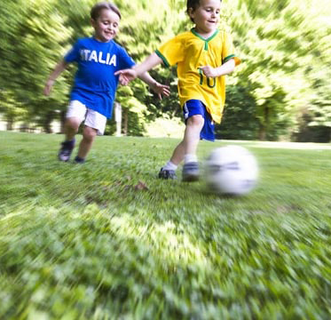 Sports Program - kids learning centre boys playing soccer